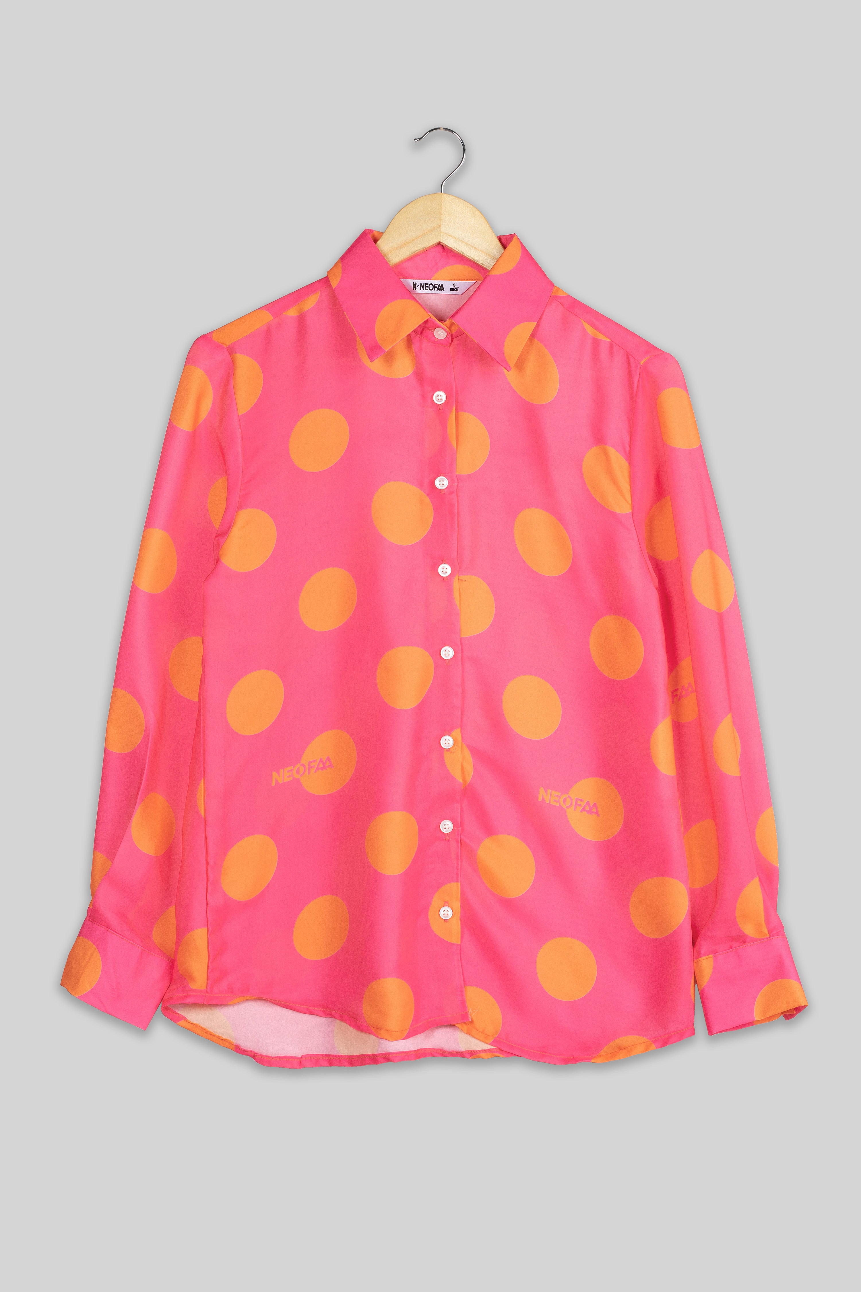 pink and white polka dot shirt